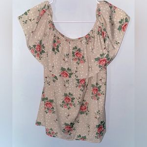 Women’s size medium, floral print shirt. Can be off shoulder or on.